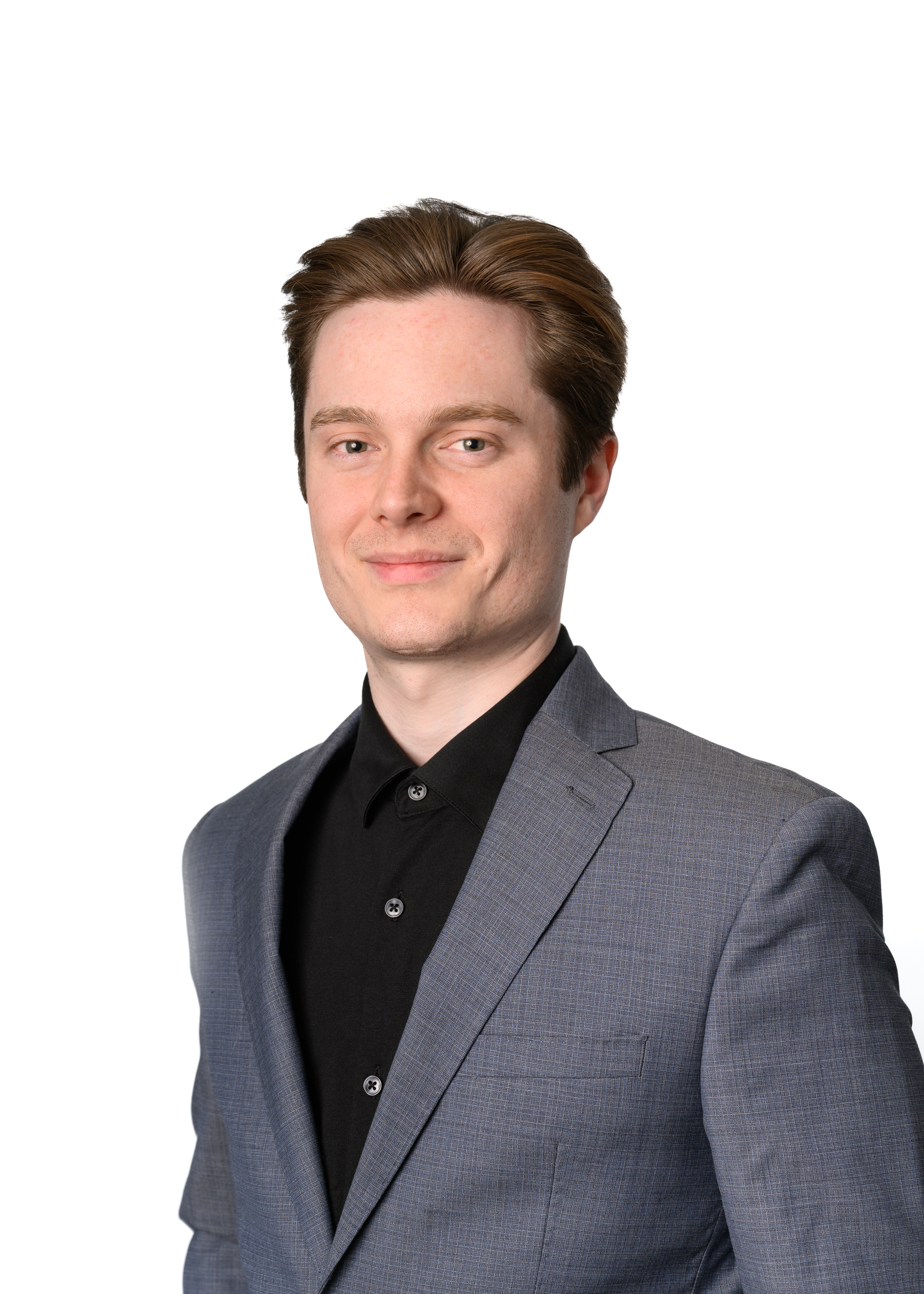 A professional portrait of Bryce Porter in a business setting